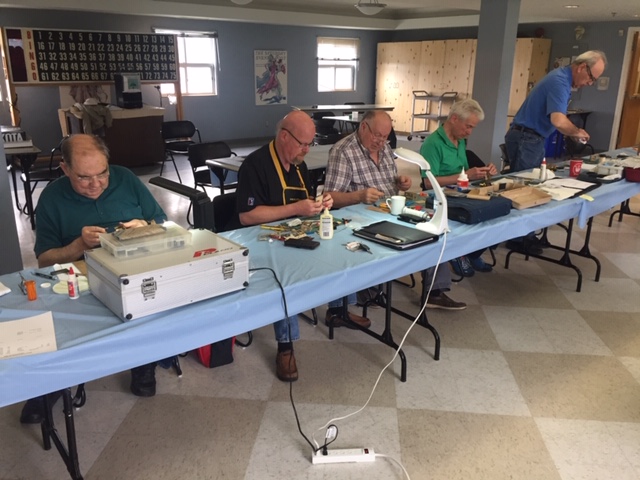 Gord, Mike, Wayne, Murray & Steve working on their kit